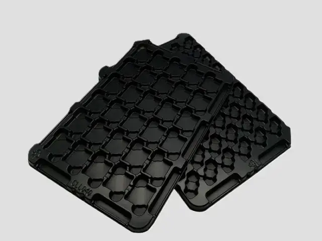 Anti-static injection molded trays